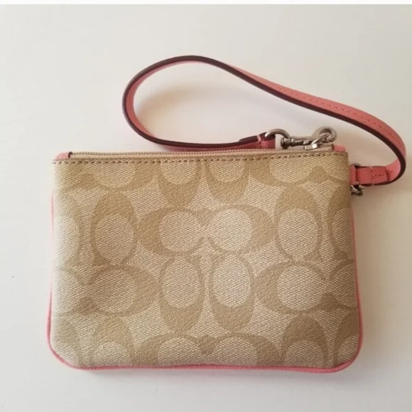 Coach Embossed Wristlet - Picture 2 of 9